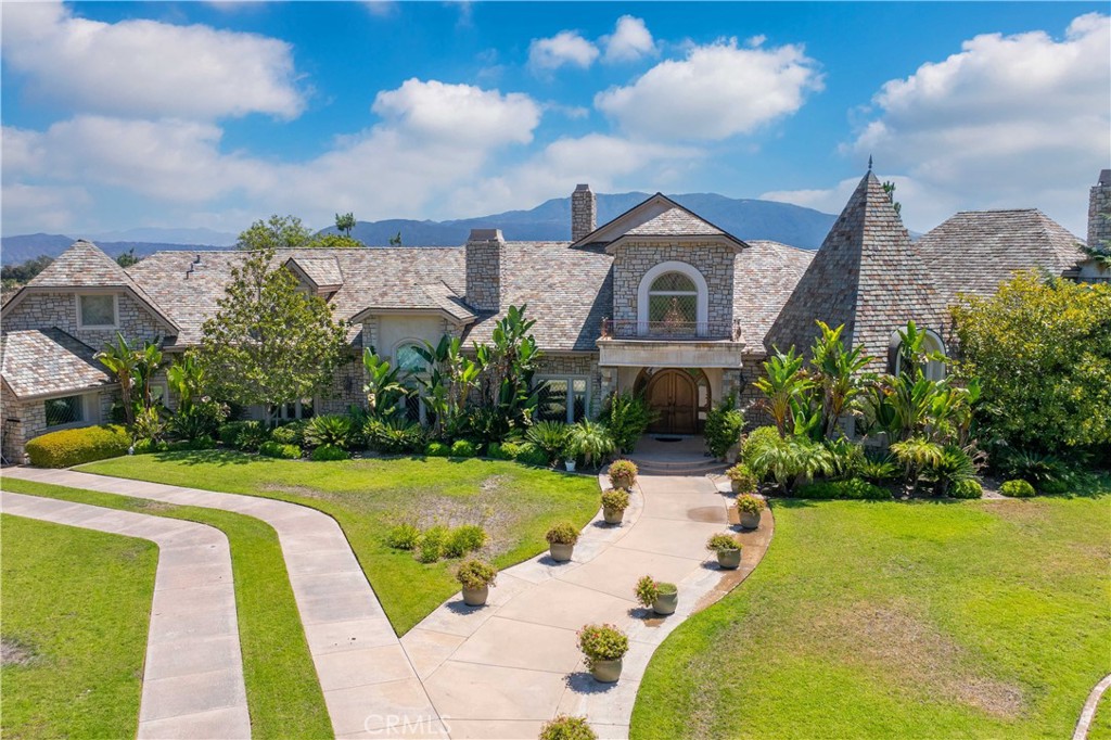 43744 Calle De Velardo Temecula, CA 92592 - Photo 52 of 60 a front view of a house with a yard