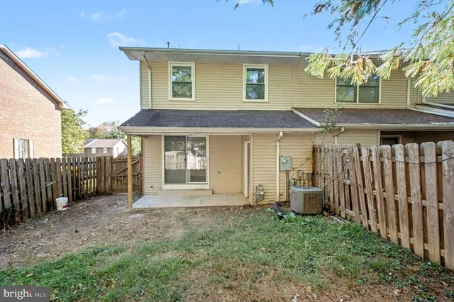 a front view of a house with a porch