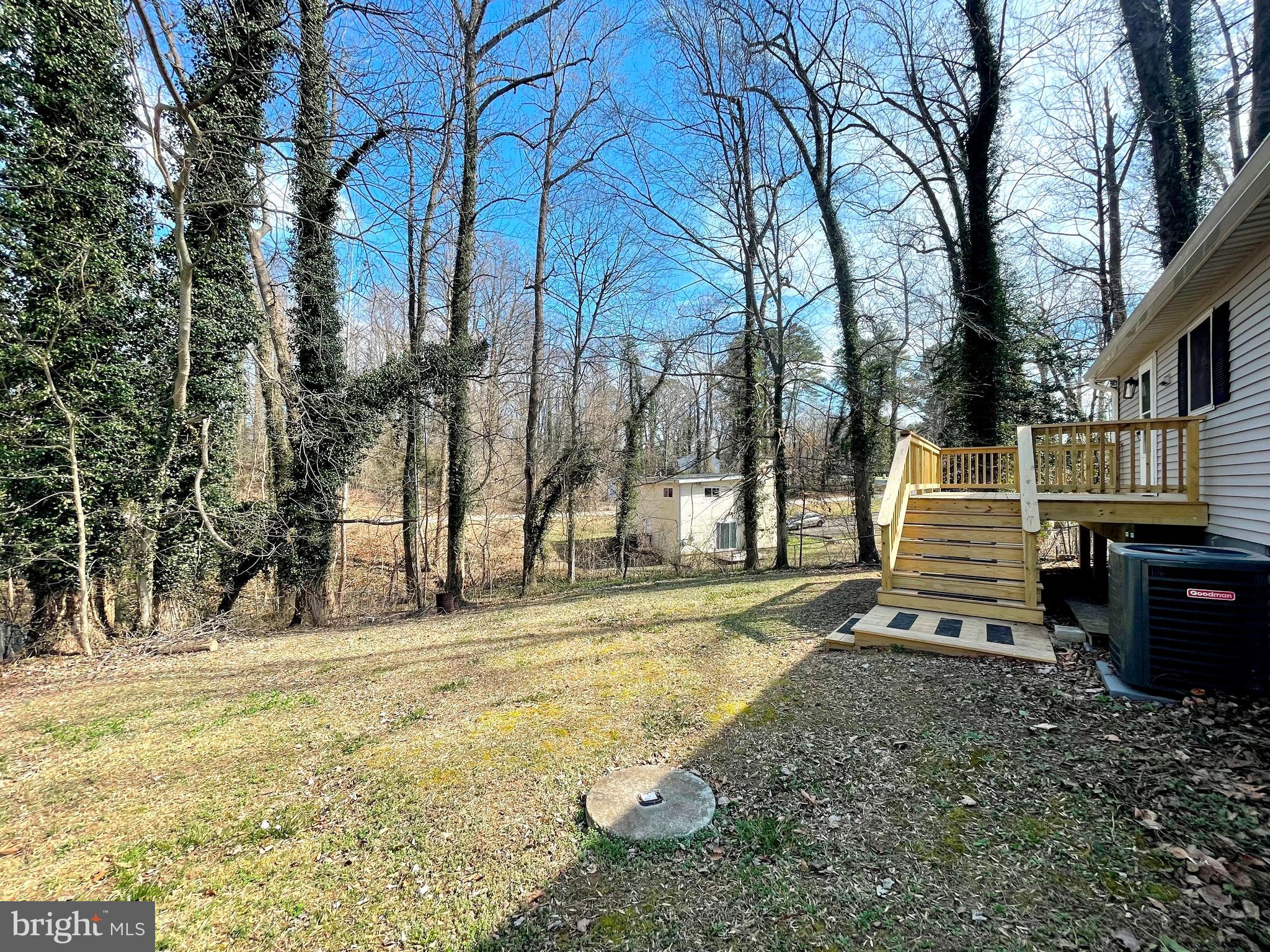 8264 Sycamore Road Lusby, MD 20657 - Photo 19 of 25 Fenced rear yard backing to wooded privacy