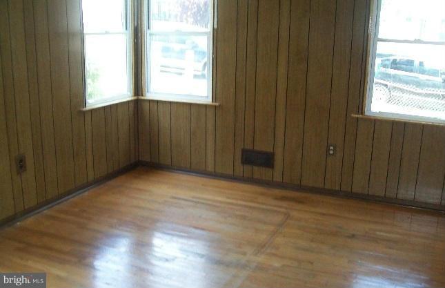 2815 Manoff Road Baltimore, MD 21227 - Photo 10 of 12 an empty room with windows