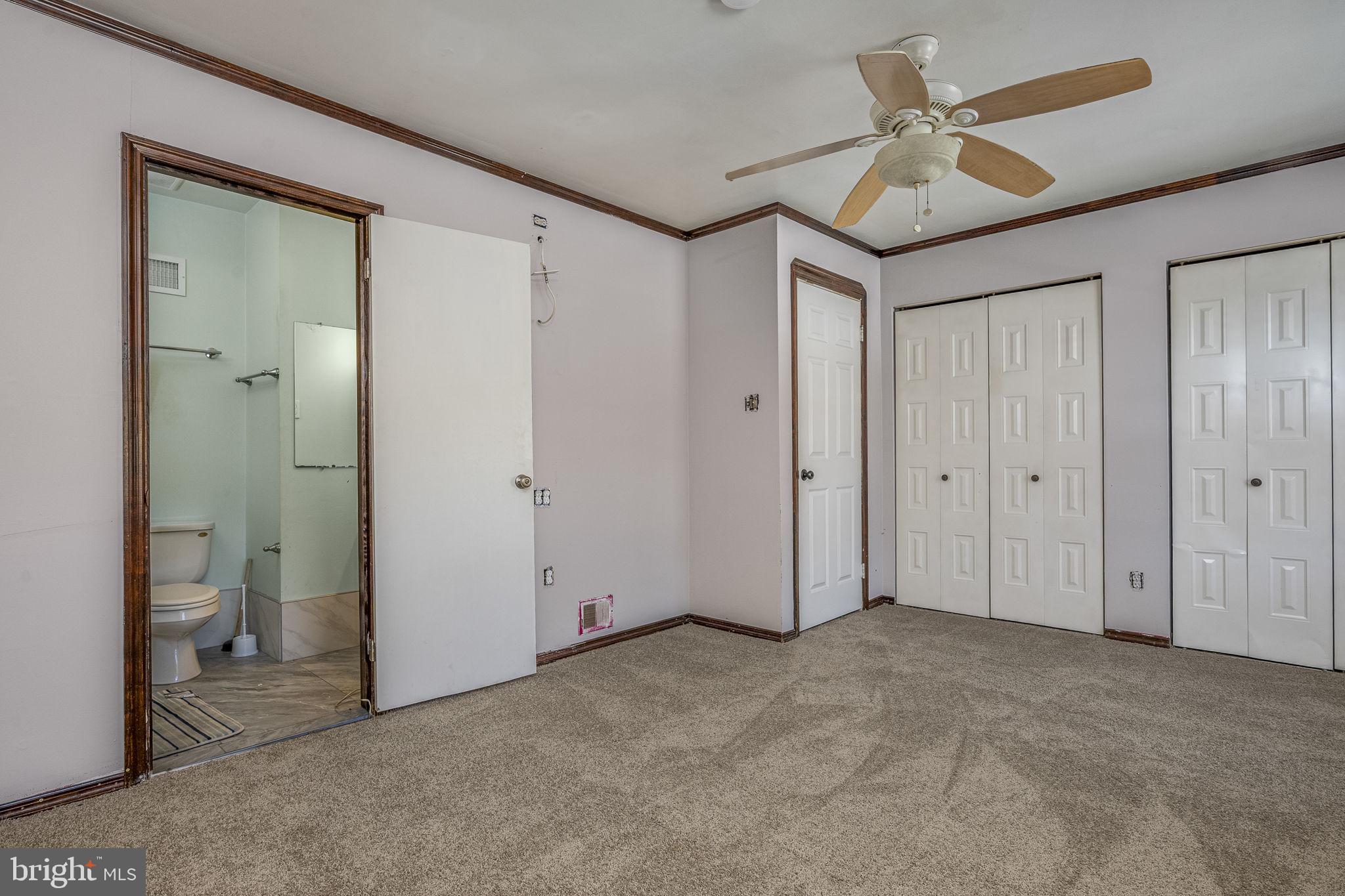 2550 Clothier Street Coatesville, PA 19320 - Photo 12 of 23 a view of empty room with a ceiling fan