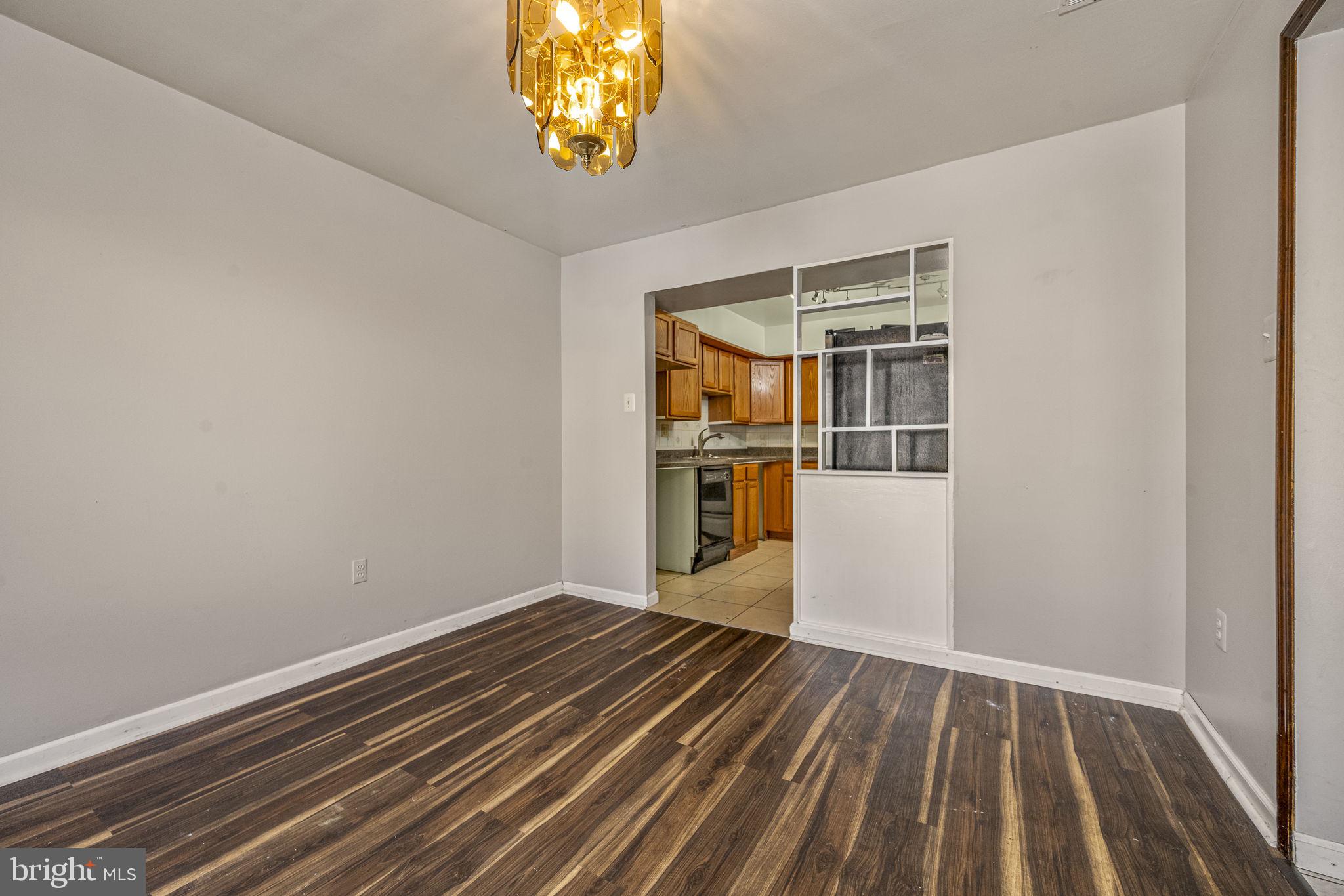 2550 Clothier Street Coatesville, PA 19320 - Photo 5 of 23 a view of empty room with wooden floor
