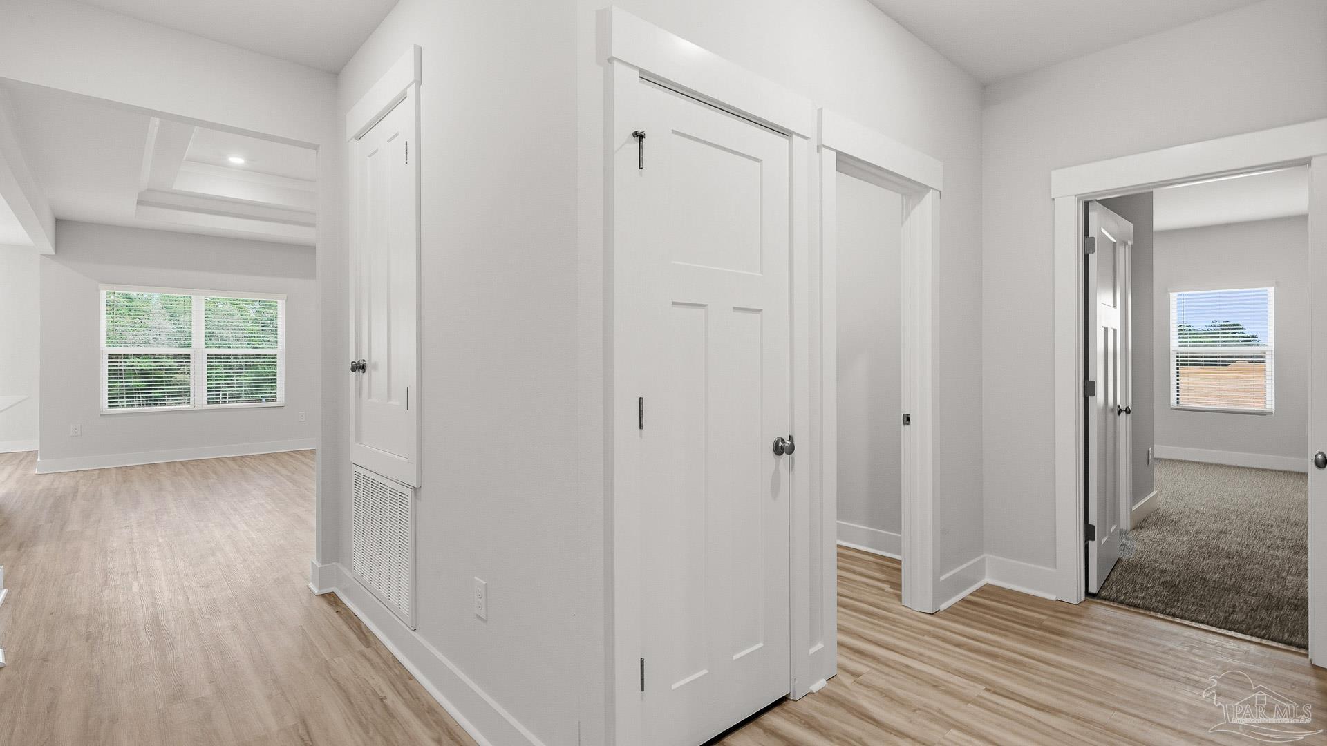 2800 Water Birch Road Cantonment, FL 32533 - Photo 12 of 37 a view of an empty room with wooden floor and a window
