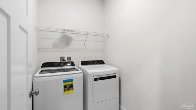 a view of an empty room and bedroom