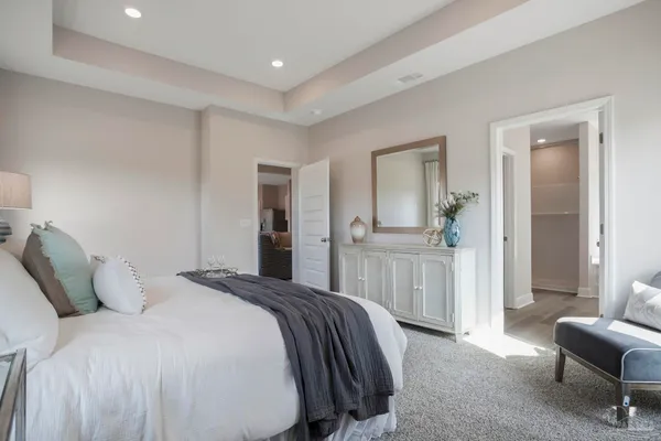 a view of a swimming pool with a lounge chair