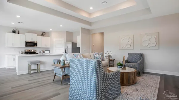 a kitchen with a sink stainless steel appliances and cabinets