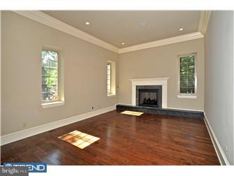449 West Valley Road Wayne, PA 19087 - Photo 3 of 12 wooden floor in an empty room with a window
