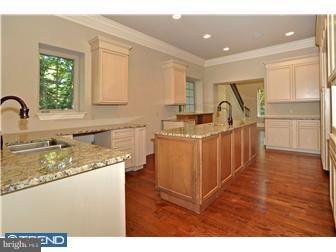 449 West Valley Road Wayne, PA 19087 - Photo 6 of 12 a kitchen with a sink appliances and a window