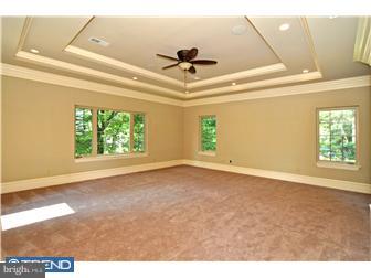 449 West Valley Road Wayne, PA 19087 - Photo 10 of 12 a view of an empty room with a window