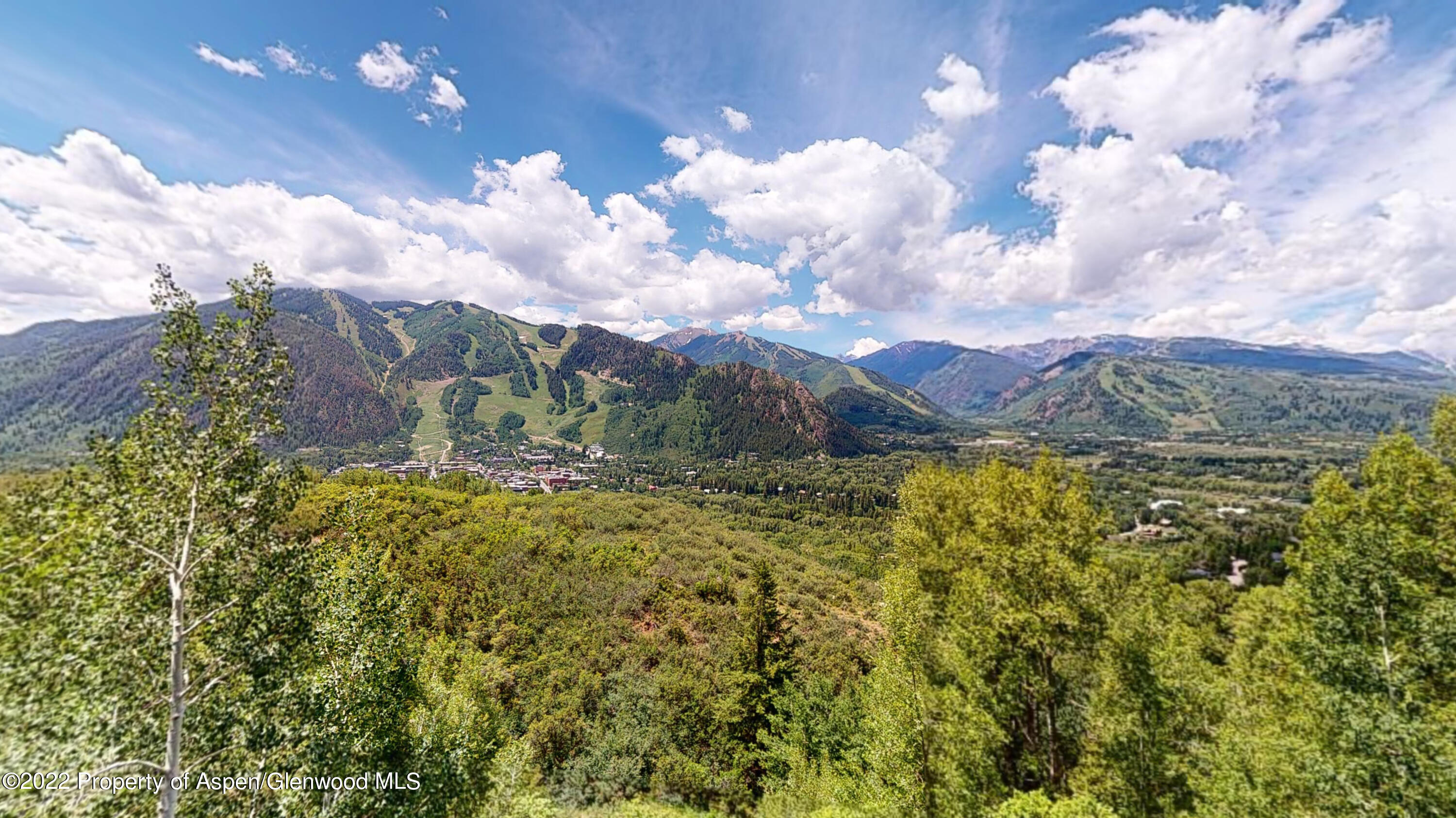 346 East Reds Road Aspen, CO 81612 - Photo 33 of 41 a view of a lake with a yard
