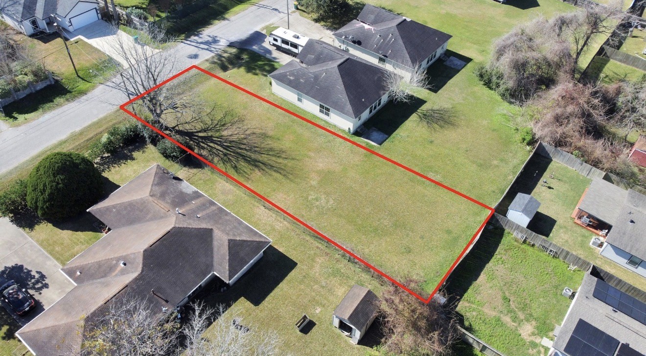 0 Boss La La Marque, TX 77568 - Photo 2 of 5 an aerial view of residential houses with outdoor space
