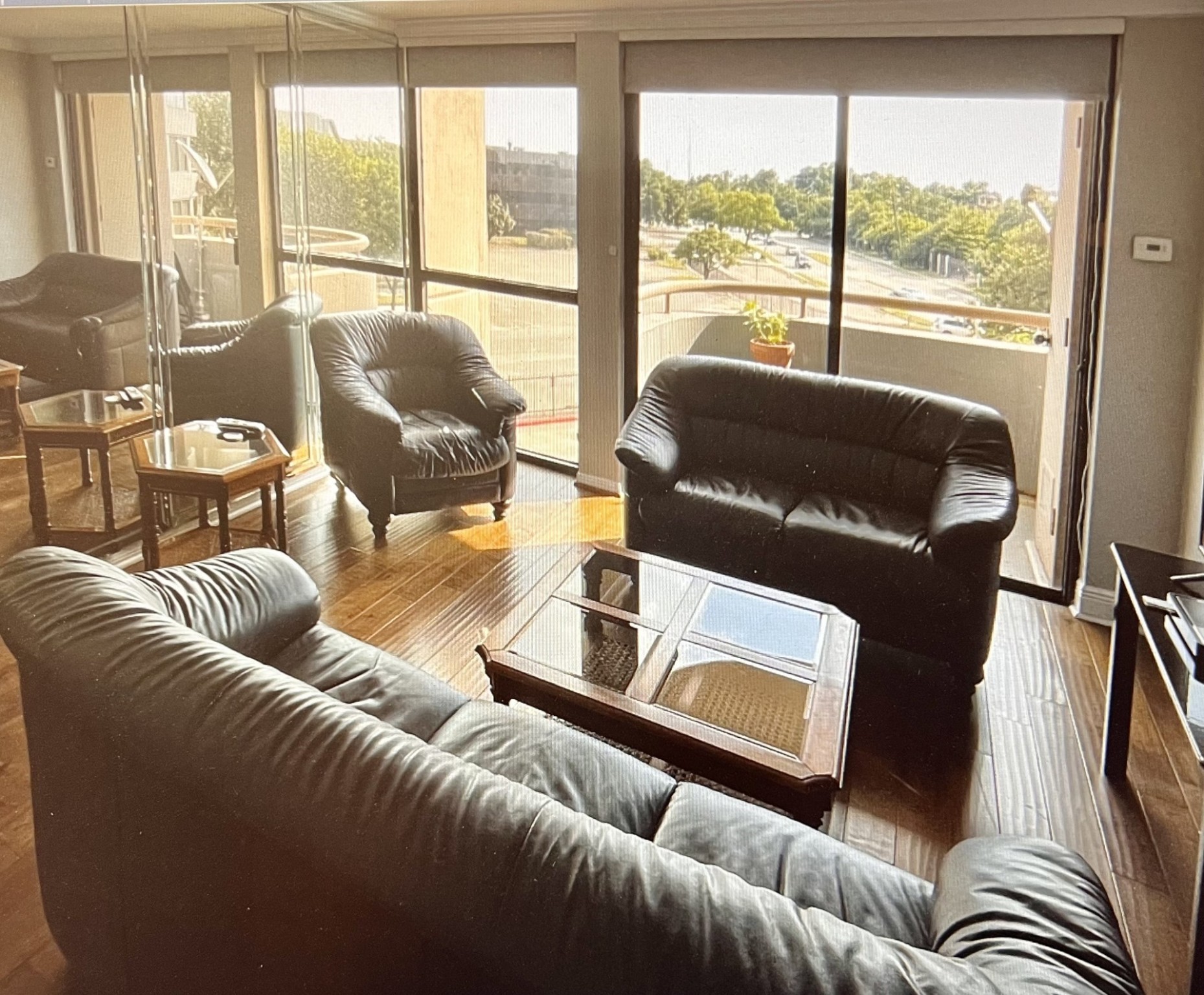 3525 Sage Road, Unit 402 Houston, TX 77056 - Photo 11 of 39 a living room with furniture and a large window