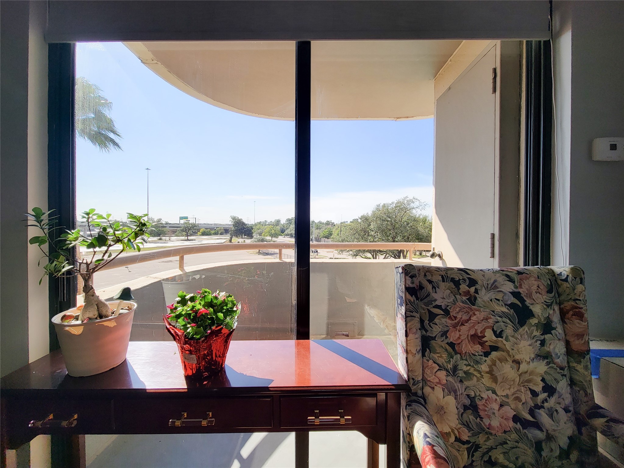 3525 Sage Road, Unit 402 Houston, TX 77056 - Photo 12 of 39 a view of a dining room with furniture window and wooden floor