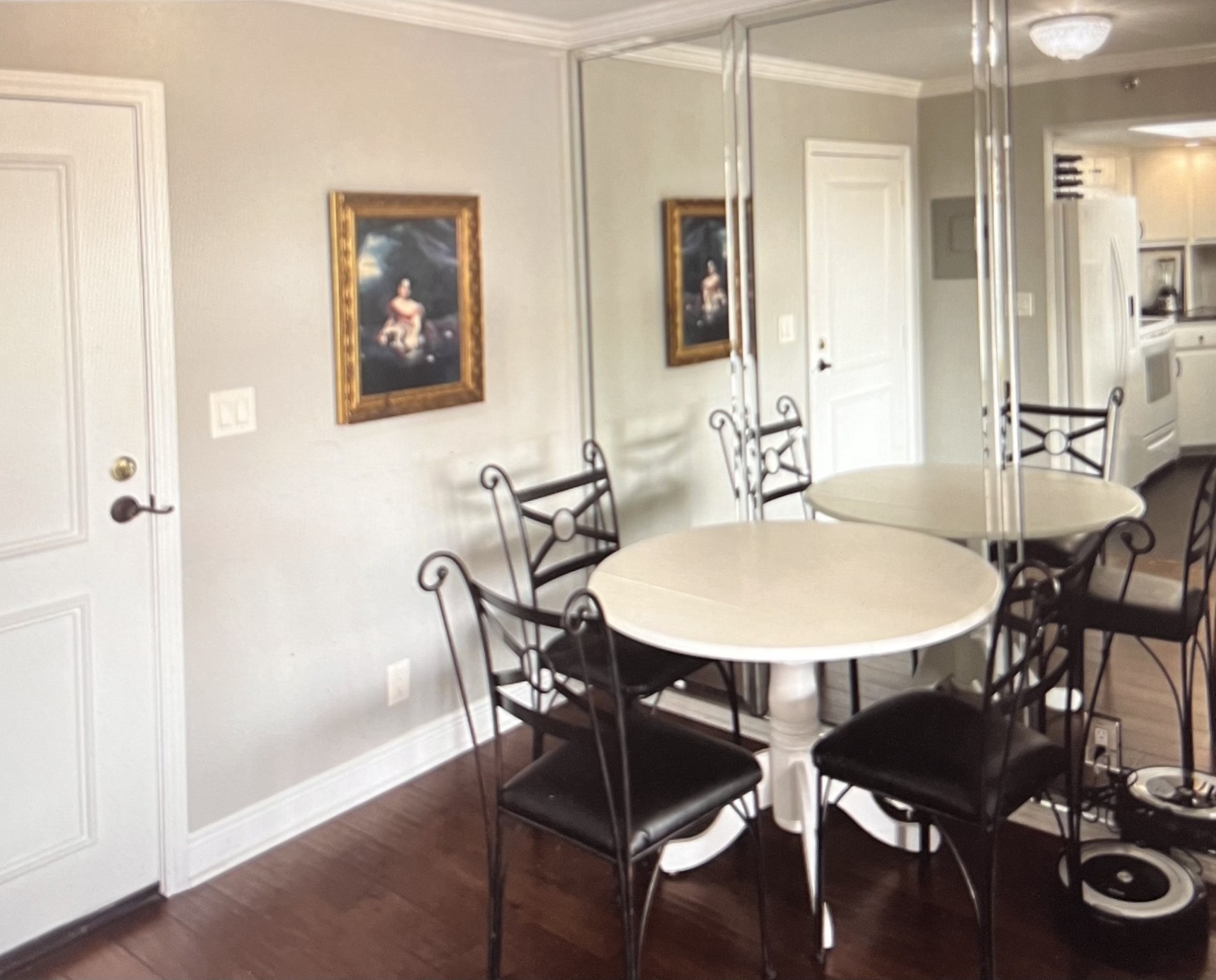3525 Sage Road, Unit 402 Houston, TX 77056 - Photo 8 of 39 a view of a dining room with furniture and wooden floor