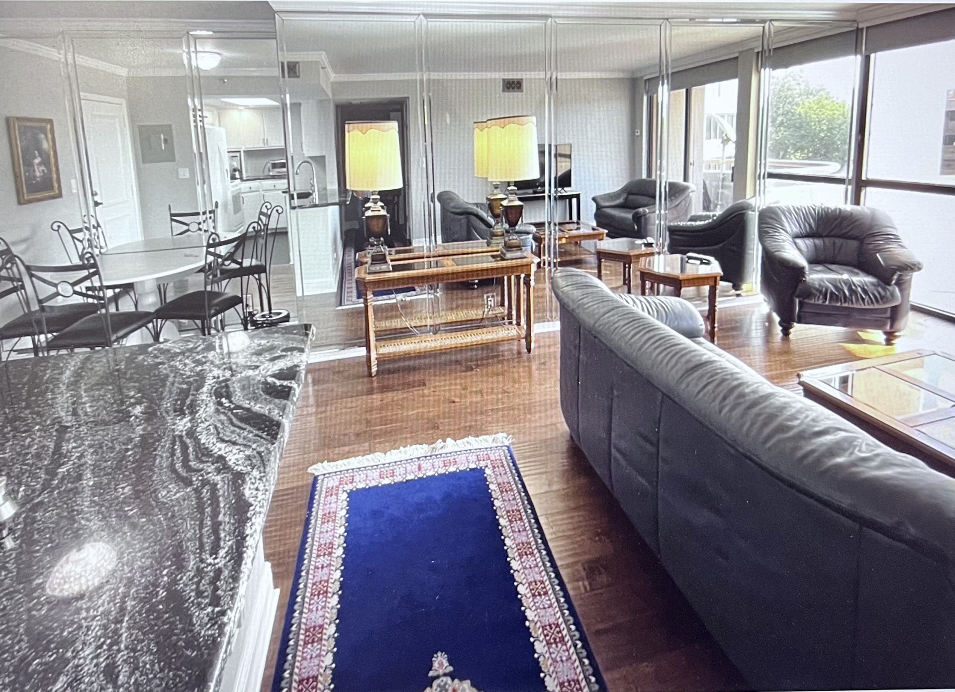 3525 Sage Road, Unit 402 Houston, TX 77056 - Photo 10 of 39 a living room with furniture and a table