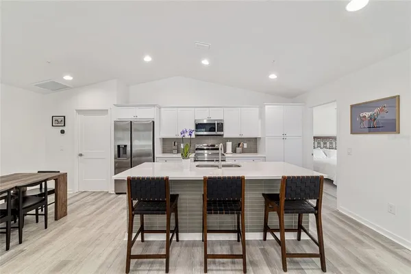 a view of a dining room with furniture