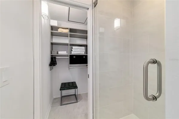 a hallway with cabinets