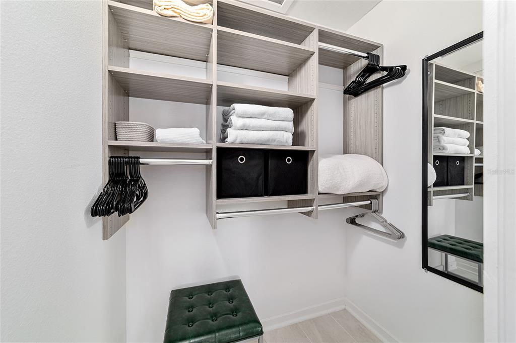 4400 Northwest 74th Terrace Ocala, FL 34482 - Photo 25 of 39 a view of walk in closet with clothes and shoes