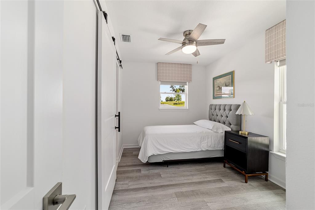 4400 Northwest 74th Terrace Ocala, FL 34482 - Photo 31 of 39 a bedroom with a bed and a closet