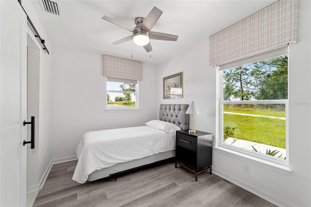 4400 Northwest 74th Terrace Ocala, FL 34482 - Photo 32 of 39 a bedroom with a bed and a window