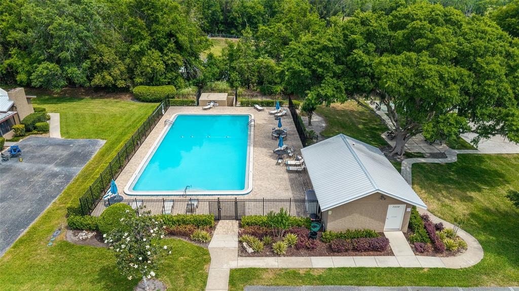 4400 Northwest 74th Terrace Ocala, FL 34482 - Photo 38 of 39 a view of a yard with chairs