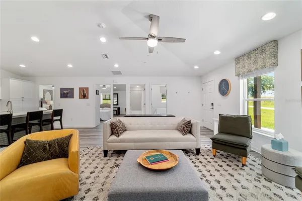 a living room with furniture and a table