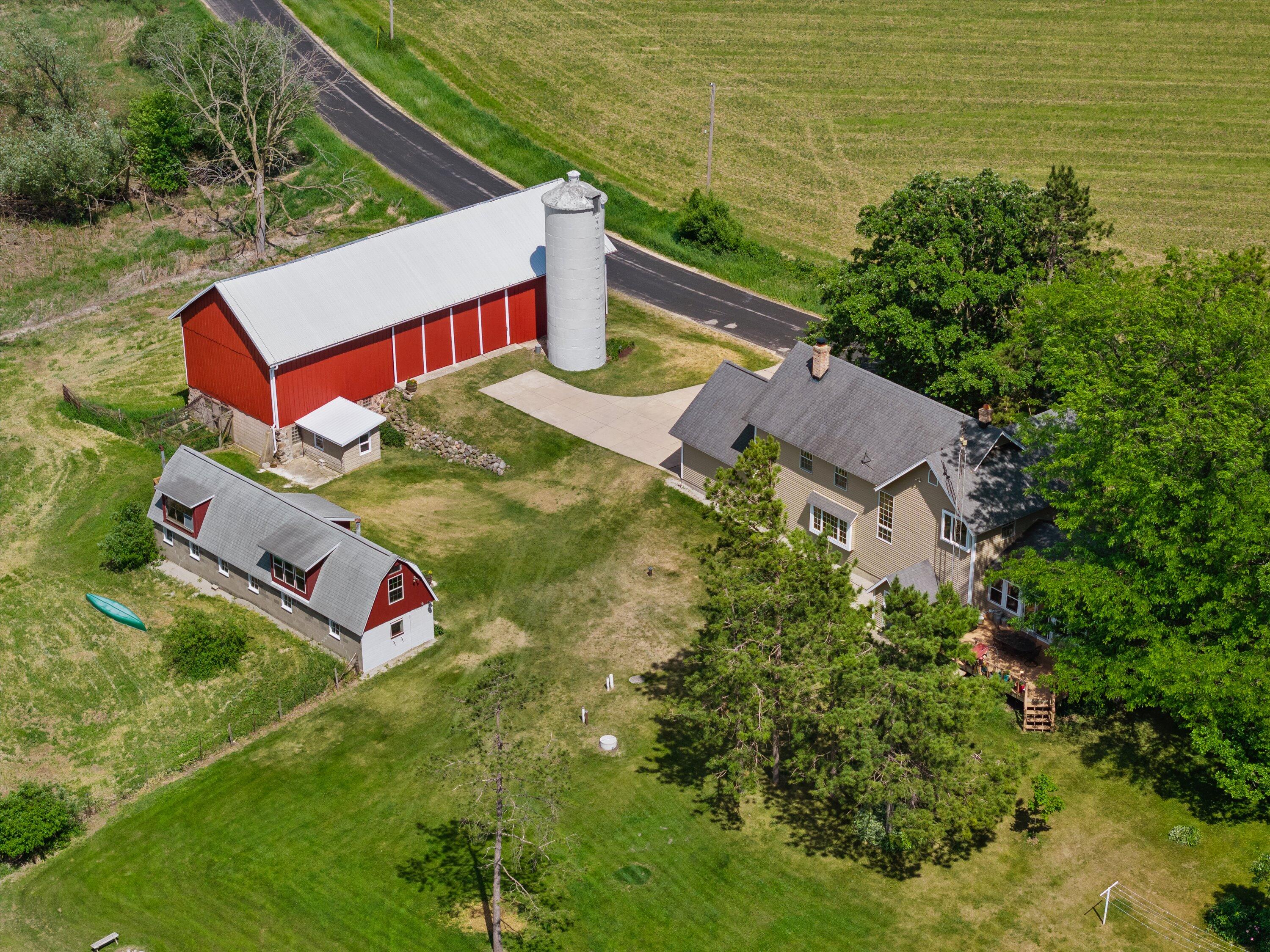 N9523 North River Road Ixonia, WI 53036 - Photo 4 of 55 Ariel view of home & barns