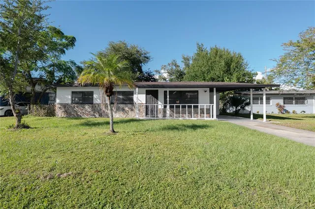 front view of house with a yard
