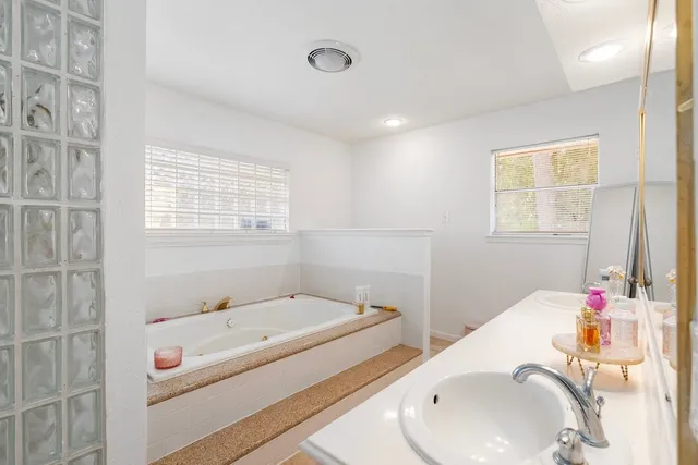 a bathroom with a sink and a bathtub