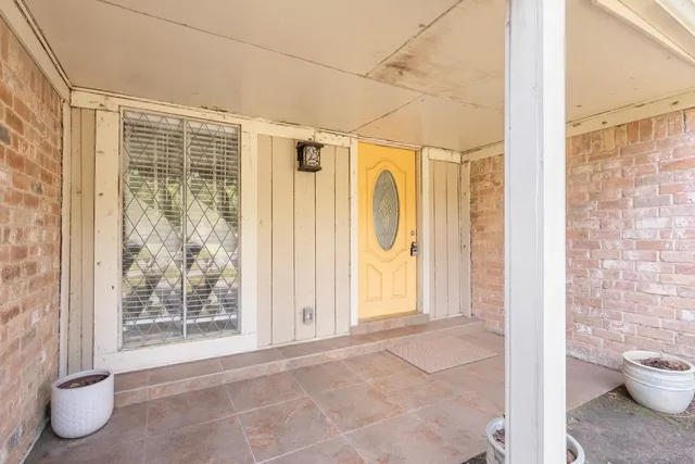a bathroom with a toilet and shower