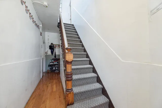 a kitchen with a table and chairs in it