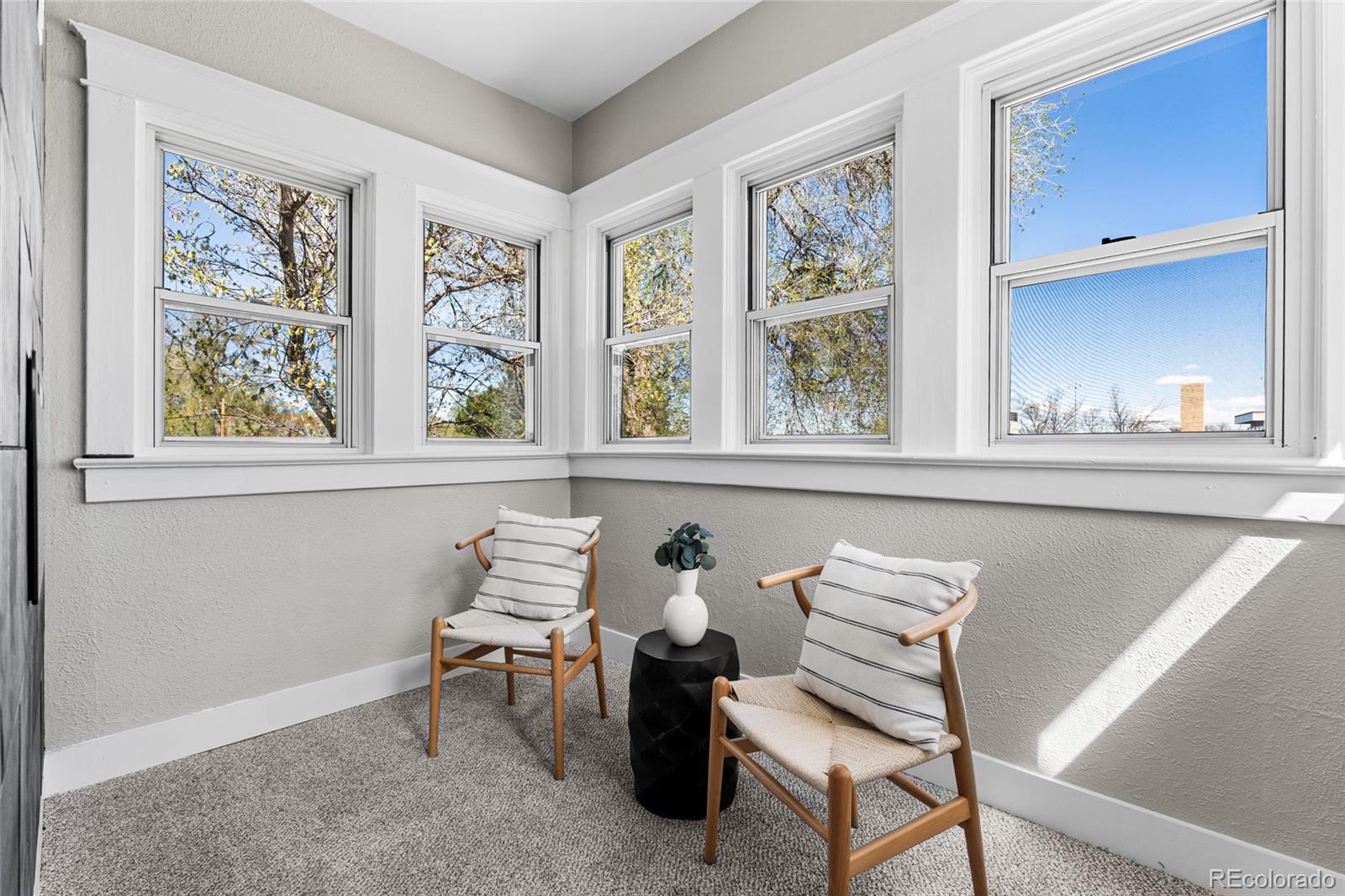 2259 Depew Street Edgewater, CO 80214 - Photo 29 of 46 a living room with furniture and windows