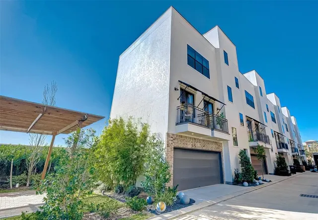 a picture of a park with a bench