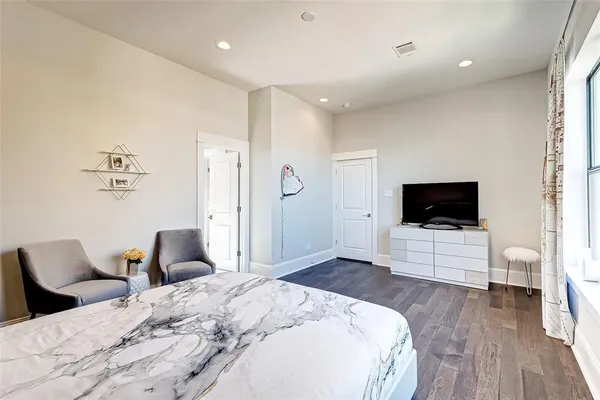 a bathroom with a double vanity sink and mirror