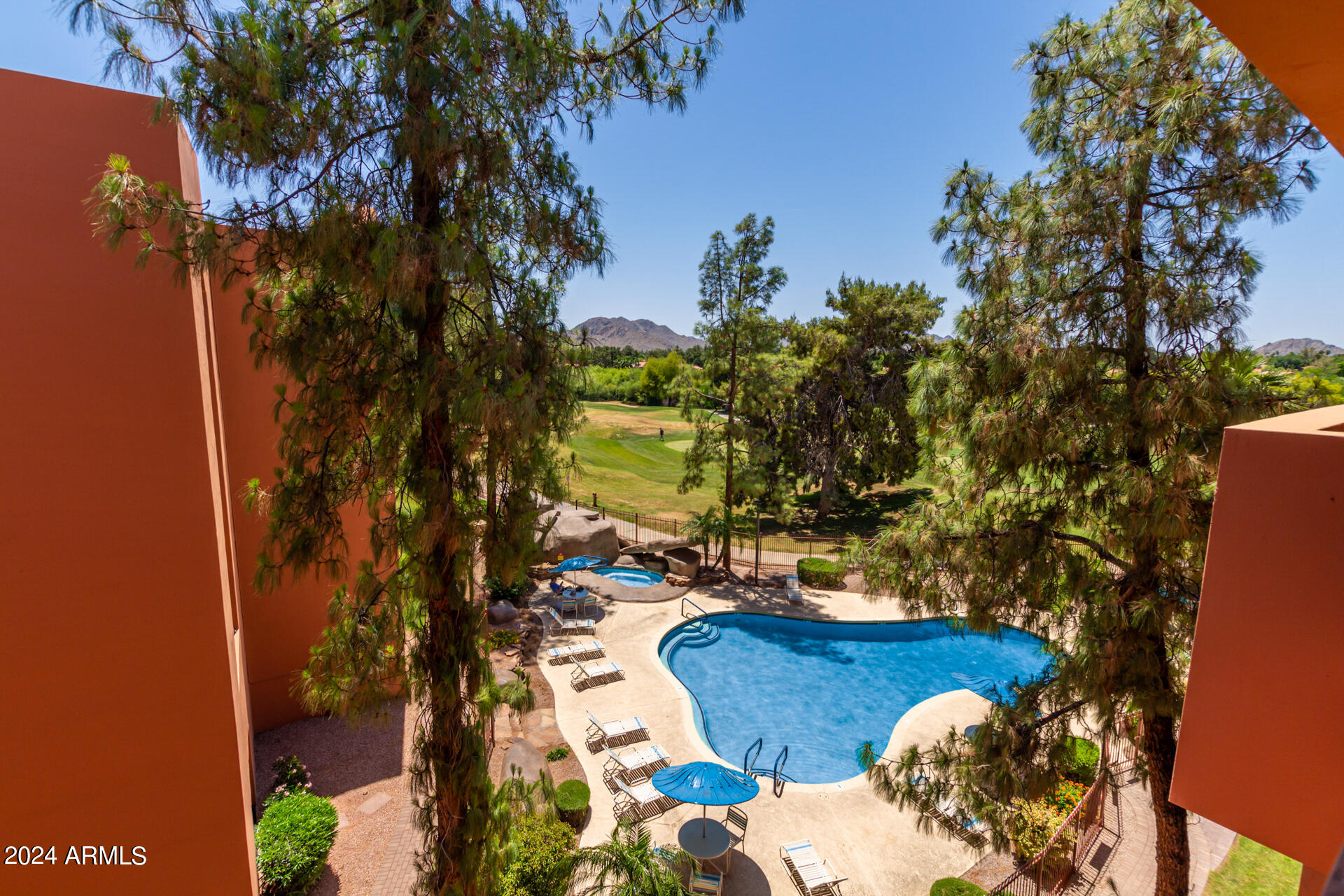 4303 East Cactus Road, Unit 442 Phoenix, AZ 85032 - Photo 14 of 27 Pool and mountain views from balcony