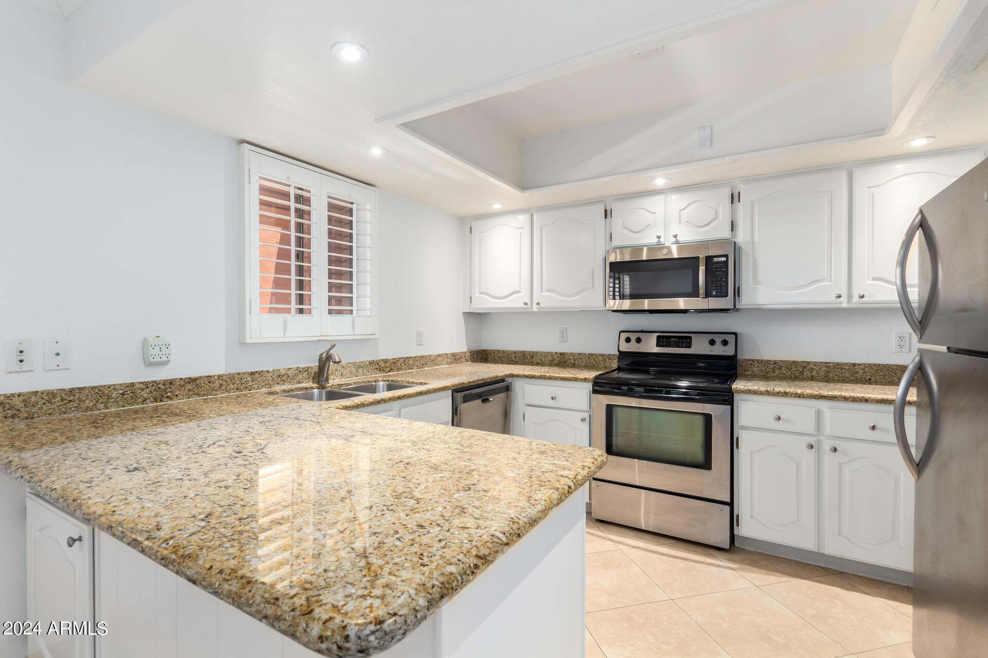 4303 East Cactus Road, Unit 442 Phoenix, AZ 85032 - Photo 3 of 27 Kitchen all stainless steel appliances
