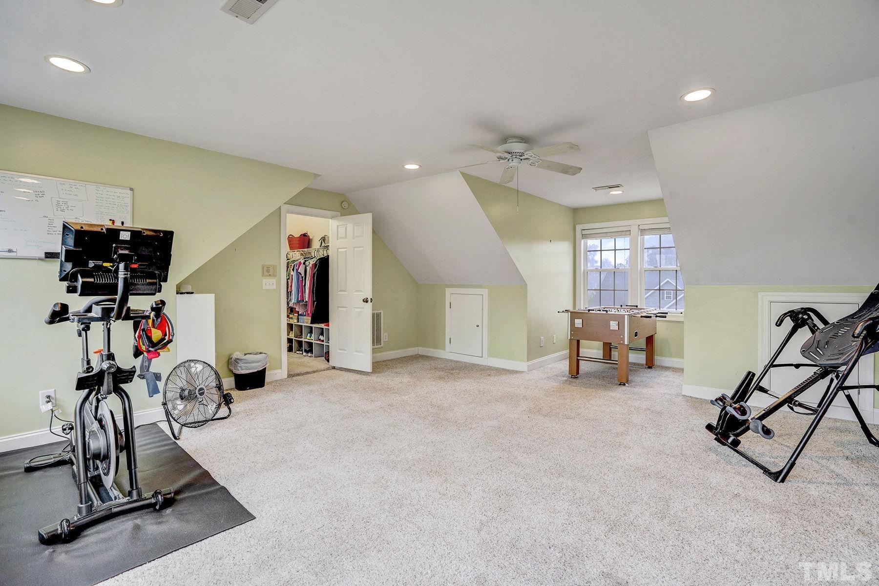 4933 Contender Drive Raleigh, NC 27603 - Photo 28 of 37 a view of a room with gym equipment