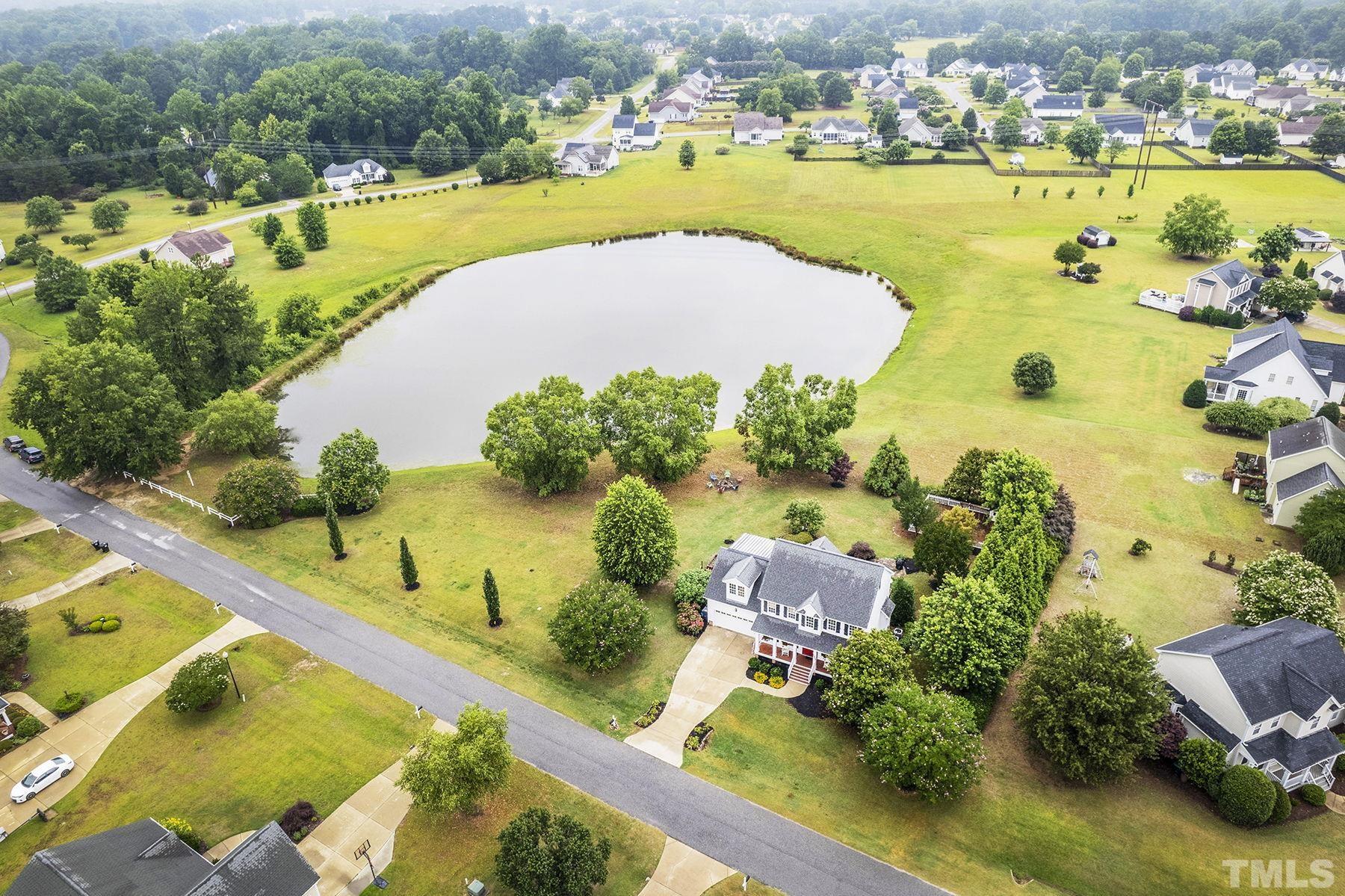 4933 Contender Drive Raleigh, NC 27603 - Photo 3 of 37 an aerial view of a house with a swimming pool yard and outdoor seating