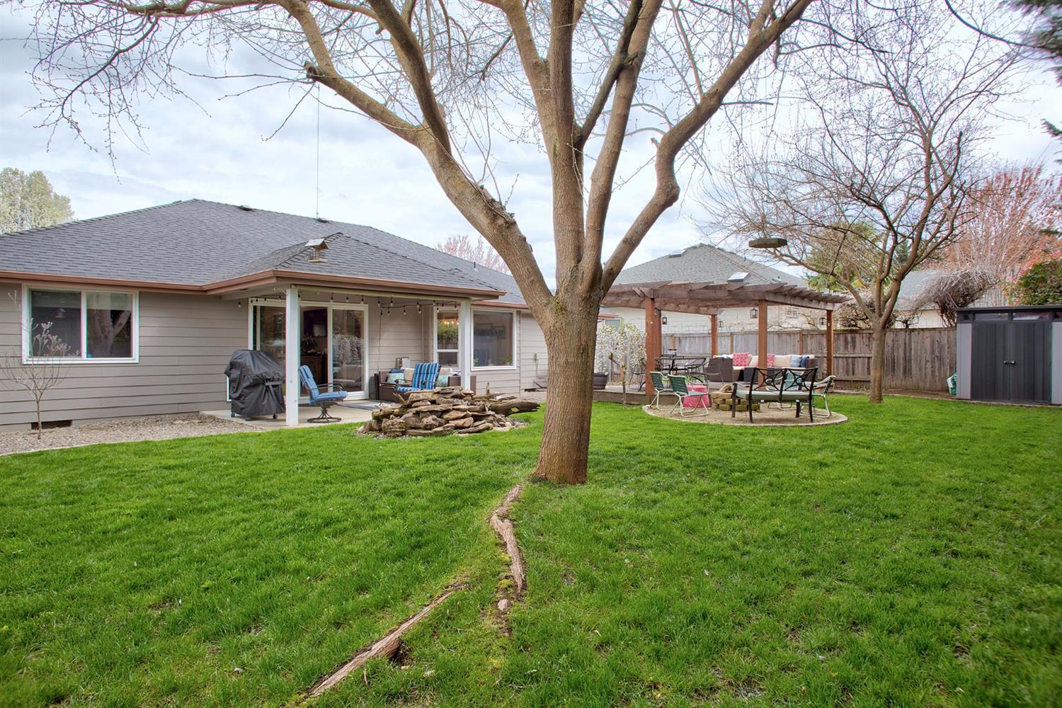 169 Orchardview Avenue Central Point, OR 97502 - Photo 27 of 28 a front view of a house with yard patio and green space