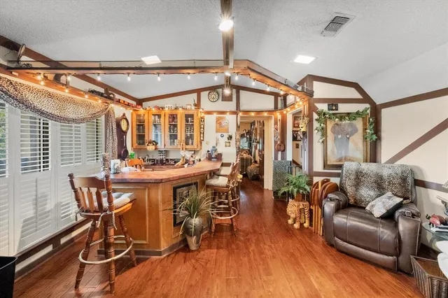 a view of a livingroom with furniture and a table