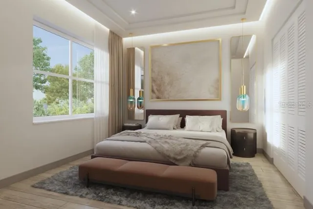 a bed room with a bed and a couch