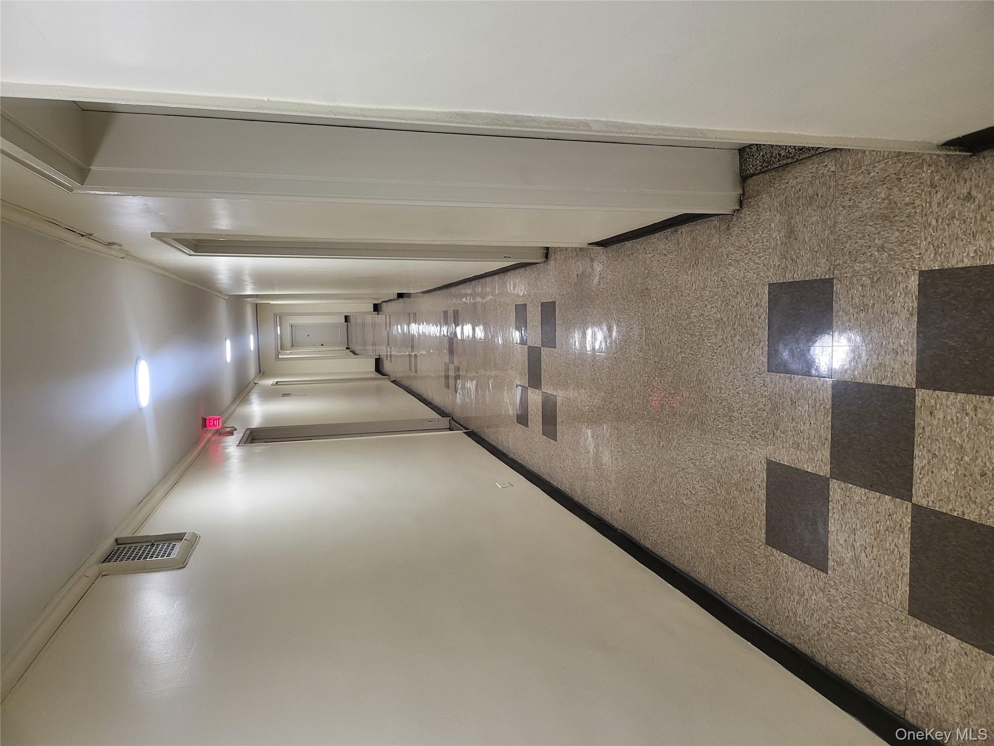 Undisclosed Address Queens, NY 11423 - Photo 19 of 22 Hall with baseboards and crown molding