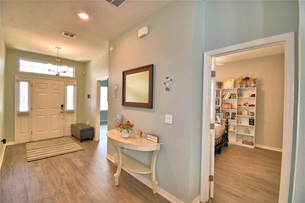 4340 Reding Way Lakeland, FL 33813 - Photo 9 of 63 a view of a livingroom with furniture and wooden floor