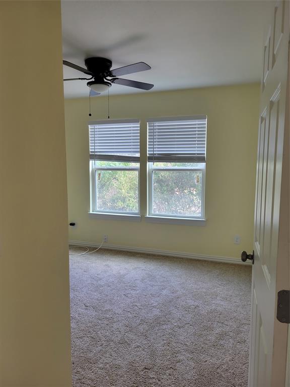 4714 Frank Street Dallas, TX 75210 - Photo 8 of 22 an empty room with a window