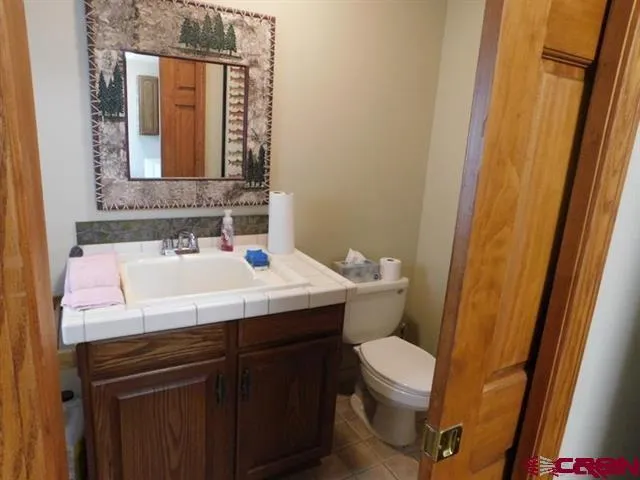 a view of living room kitchen and dining room