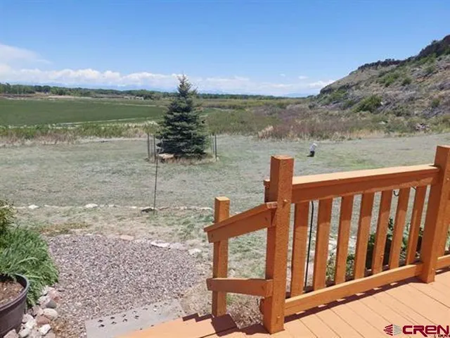 a view of a lake with a mountain in the background