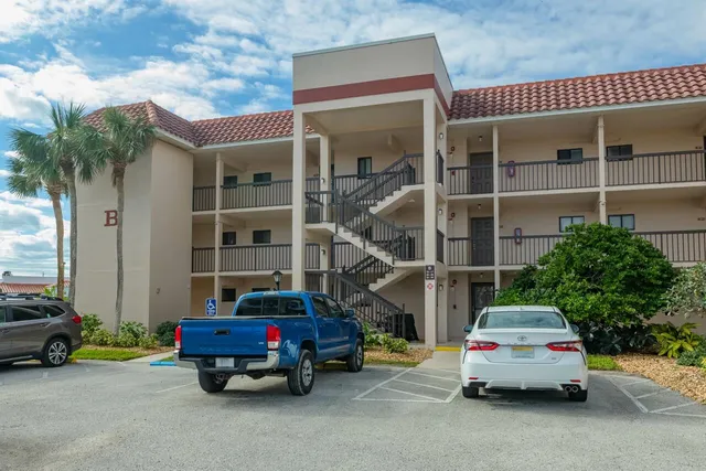 a car parked in front of a house