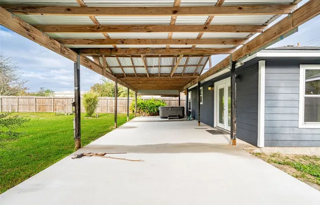 a view of a porch with a backyard