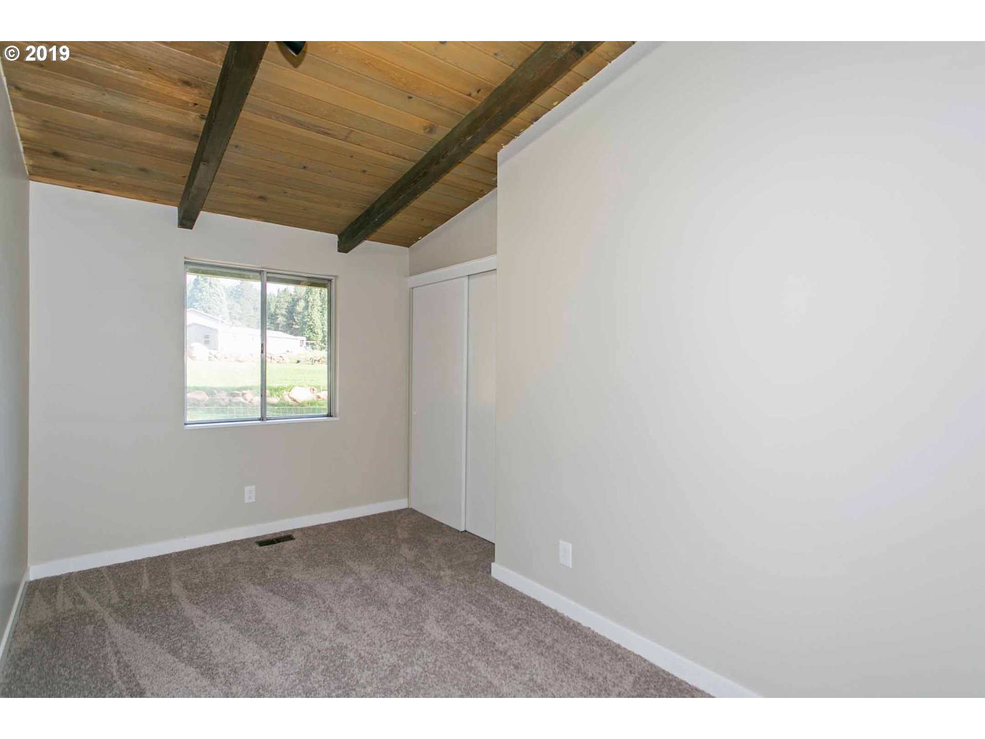13010 South Union Hall Road Canby, OR 97013 - Photo 17 of 31 a view of an empty room with a window