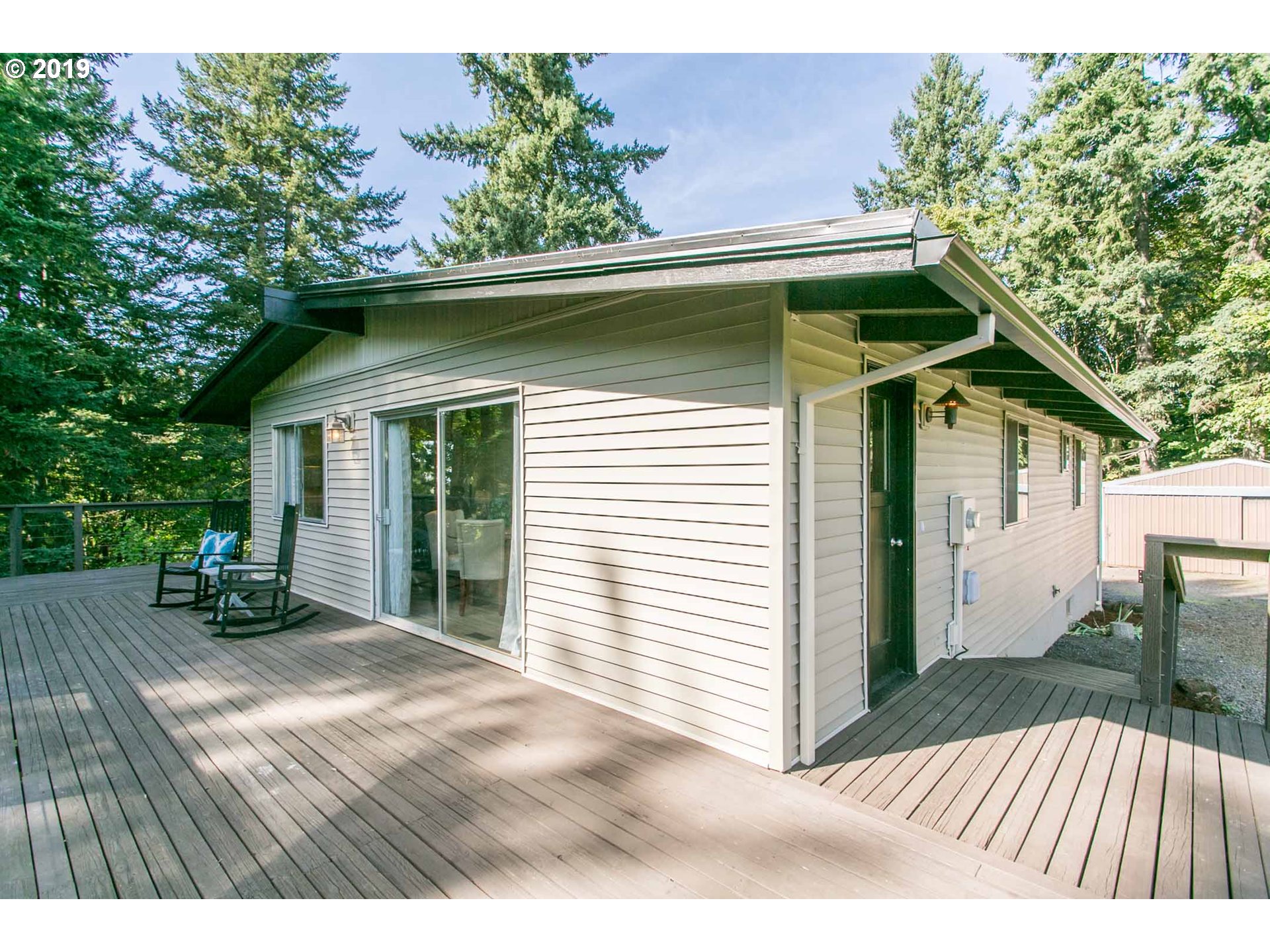 13010 South Union Hall Road Canby, OR 97013 - Photo 5 of 31 a view of backyard with a deck and patio